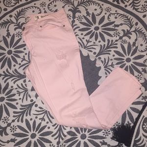 Pink destroyed jeans